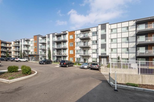 306-360 Harvest Hills Way Ne, Calgary, AB - Outdoor With Balcony With Facade