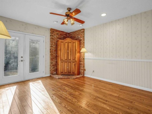 76 Wood Valley Rise Sw, Calgary, AB - Indoor Photo Showing Other Room