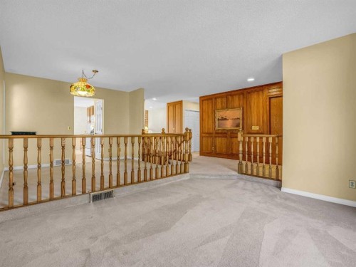 76 Wood Valley Rise Sw, Calgary, AB - Indoor Photo Showing Other Room