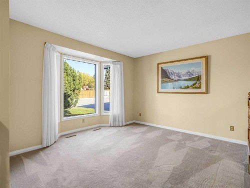 76 Wood Valley Rise Sw, Calgary, AB - Indoor Photo Showing Other Room