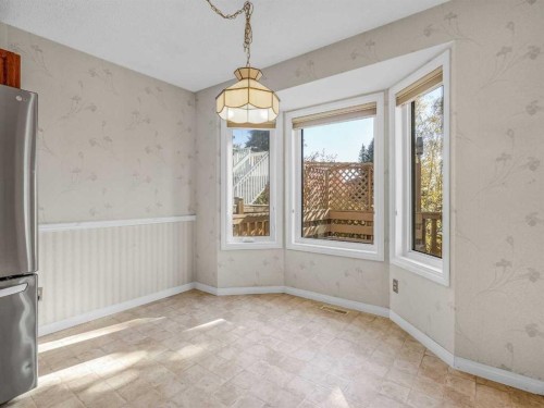 76 Wood Valley Rise Sw, Calgary, AB - Indoor Photo Showing Other Room