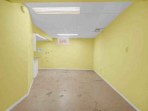76 Wood Valley Rise Sw, Calgary, AB - Indoor Photo Showing Basement