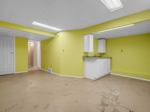 76 Wood Valley Rise Sw, Calgary, AB - Indoor Photo Showing Basement