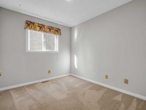 76 Wood Valley Rise Sw, Calgary, AB - Indoor Photo Showing Other Room