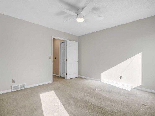 76 Wood Valley Rise Sw, Calgary, AB - Indoor Photo Showing Other Room