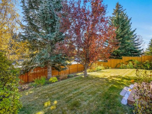 76 Wood Valley Rise Sw, Calgary, AB - Outdoor With Backyard