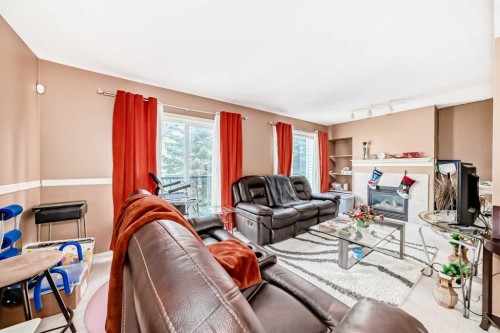 28-200 Hidden Hills Terrace Nw, Calgary, AB - Indoor Photo Showing Living Room