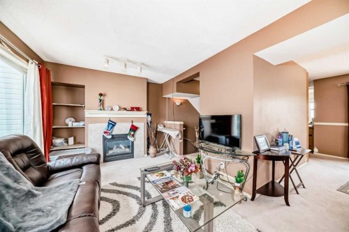 28-200 Hidden Hills Terrace Nw, Calgary, AB - Indoor With Fireplace