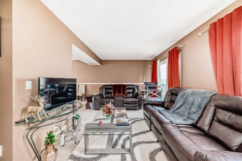 28-200 Hidden Hills Terrace Nw, Calgary, AB - Indoor Photo Showing Living Room