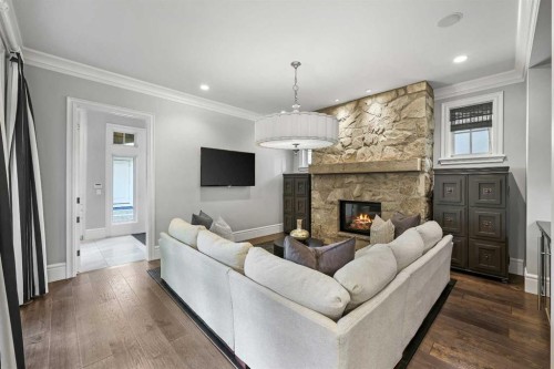 420 49 Avenue Sw, Calgary, AB - Indoor Photo Showing Living Room With Fireplace