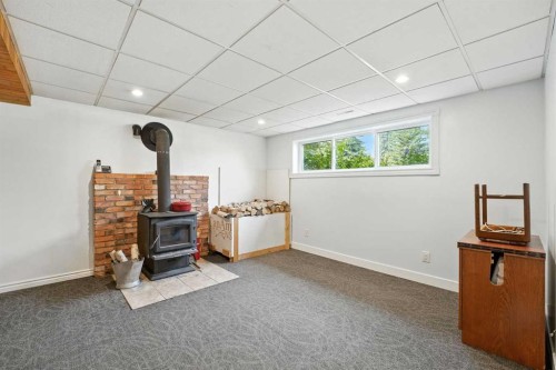 1454 Hunterbrook Road Nw, Calgary, AB - Indoor With Fireplace