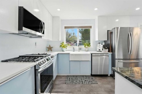 1454 Hunterbrook Road Nw, Calgary, AB - Indoor Photo Showing Kitchen With Stainless Steel Kitchen With Upgraded Kitchen