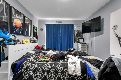 442 Saddlecreek Way Ne, Calgary, AB - Indoor Photo Showing Bedroom