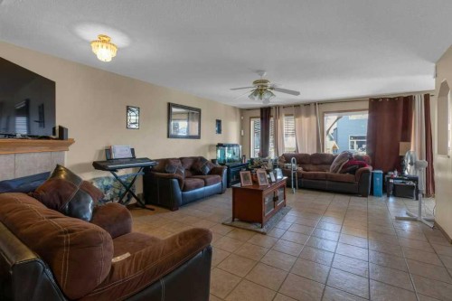442 Saddlecreek Way Ne, Calgary, AB - Indoor Photo Showing Living Room