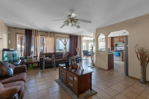 442 Saddlecreek Way Ne, Calgary, AB - Indoor Photo Showing Living Room
