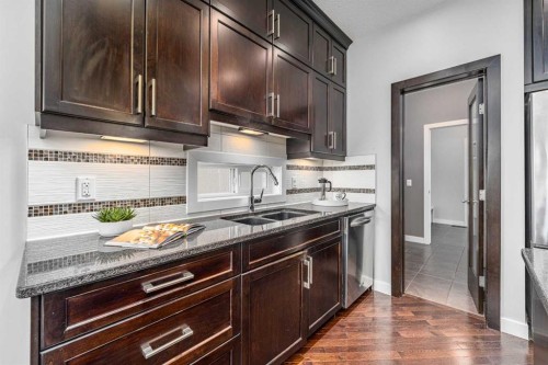 370 Williamstown Green Nw, Airdrie, AB - Indoor Photo Showing Kitchen With Double Sink