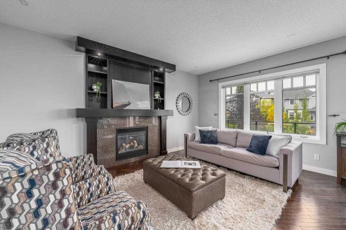370 Williamstown Green Nw, Airdrie, AB - Indoor Photo Showing Living Room With Fireplace
