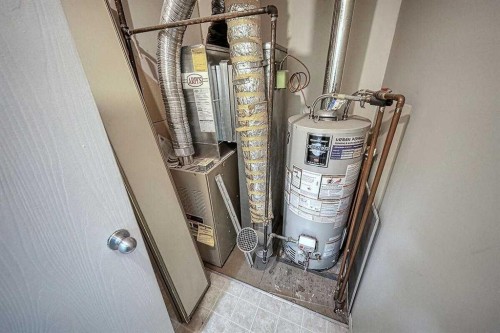 206-2200 Woodview Drive Sw, Calgary, AB - Indoor Photo Showing Basement