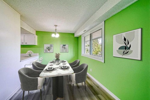 206-2200 Woodview Drive Sw, Calgary, AB - Indoor Photo Showing Dining Room