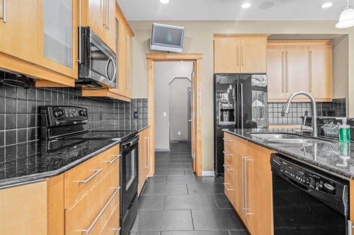 116 Willowmere Way, Chestermere, AB - Indoor Photo Showing Kitchen With Double Sink With Upgraded Kitchen