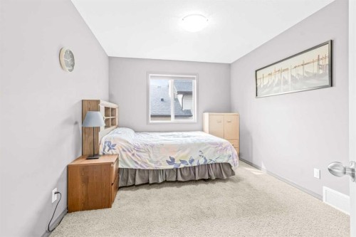 116 Willowmere Way, Chestermere, AB - Indoor Photo Showing Bedroom