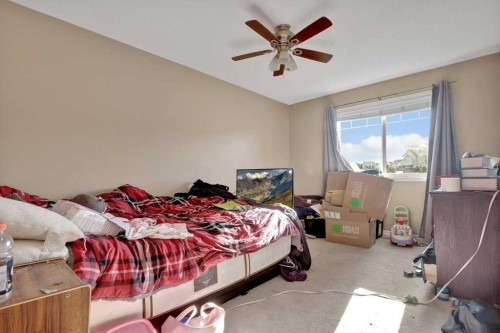 #1201-2384 Sagewood Gate Sw, Airdrie, AB - Indoor Photo Showing Bedroom
