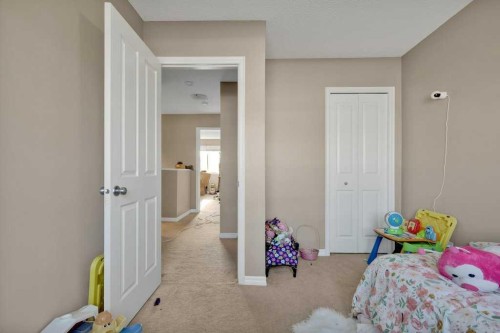 #1201-2384 Sagewood Gate Sw, Airdrie, AB - Indoor Photo Showing Bedroom