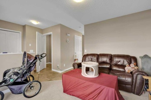 #1201-2384 Sagewood Gate Sw, Airdrie, AB - Indoor Photo Showing Living Room