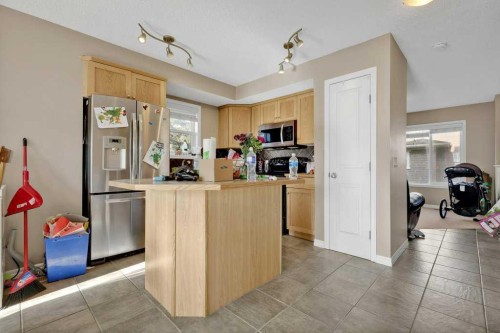 #1201-2384 Sagewood Gate Sw, Airdrie, AB - Indoor Photo Showing Kitchen