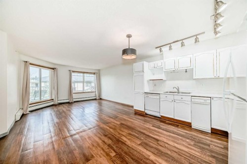 304-7 Somervale View Sw, Calgary, AB - Indoor Photo Showing Kitchen With Double Sink