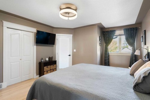 341 Sunset Place, Okotoks, AB - Indoor Photo Showing Bedroom
