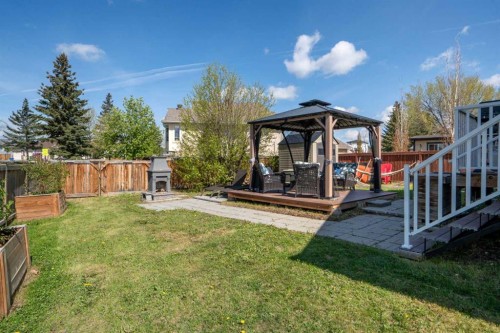 341 Sunset Place, Okotoks, AB - Outdoor With Deck Patio Veranda