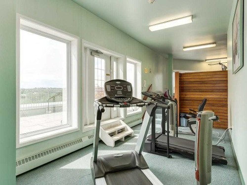 160-310 8 Street Sw, Calgary, AB - Indoor Photo Showing Gym Room