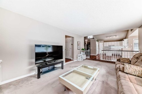 1405 Shawnee Road Sw, Calgary, AB - Indoor Photo Showing Living Room