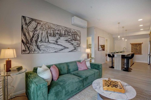 409-245 Edith Place Nw, Calgary, AB - Indoor Photo Showing Living Room