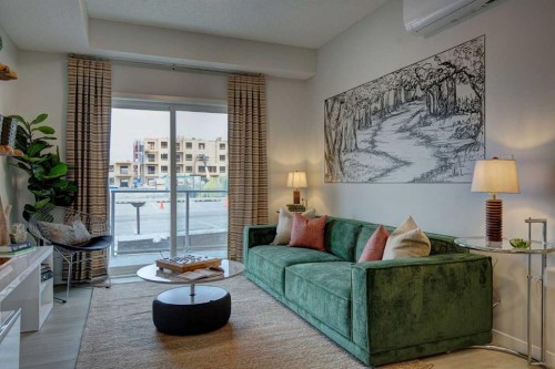 409-245 Edith Place Nw, Calgary, AB - Indoor Photo Showing Living Room