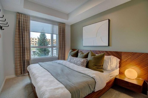 409-245 Edith Place Nw, Calgary, AB - Indoor Photo Showing Bedroom