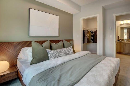 409-245 Edith Place Nw, Calgary, AB - Indoor Photo Showing Bedroom