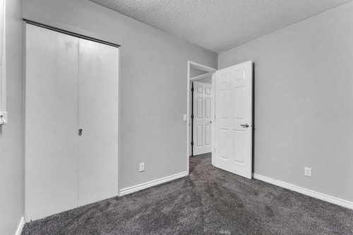251 Rundlecairn Road Ne, Calgary, AB - Indoor Photo Showing Other Room