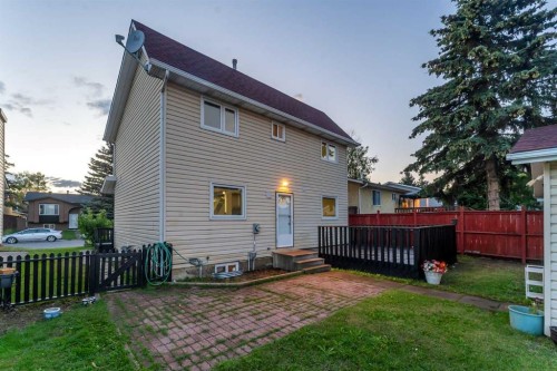 251 Rundlecairn Road Ne, Calgary, AB - Outdoor With Deck Patio Veranda With Exterior