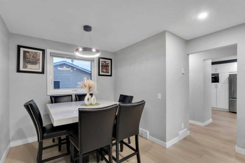 251 Rundlecairn Road Ne, Calgary, AB - Indoor Photo Showing Dining Room