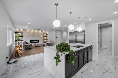 7 Mystic Ridge Way Sw, Calgary, AB - Indoor Photo Showing Kitchen With Double Sink With Upgraded Kitchen