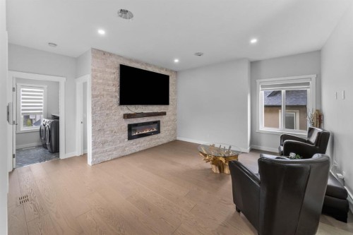 7 Mystic Ridge Way Sw, Calgary, AB - Indoor With Fireplace