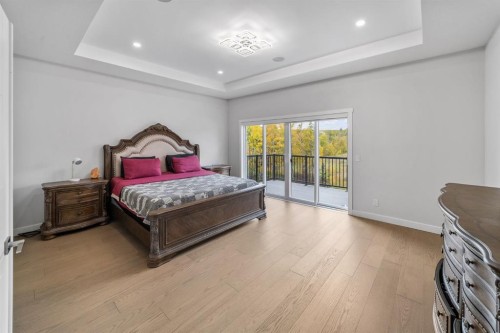 7 Mystic Ridge Way Sw, Calgary, AB - Indoor Photo Showing Bedroom