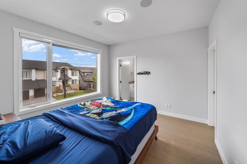 7 Mystic Ridge Way Sw, Calgary, AB - Indoor Photo Showing Bedroom
