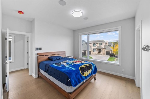 7 Mystic Ridge Way Sw, Calgary, AB - Indoor Photo Showing Bedroom