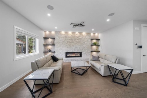 7 Mystic Ridge Way Sw, Calgary, AB - Indoor Photo Showing Living Room With Fireplace