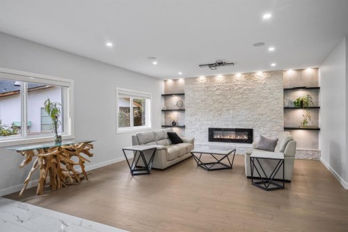 7 Mystic Ridge Way Sw, Calgary, AB - Indoor Photo Showing Living Room With Fireplace