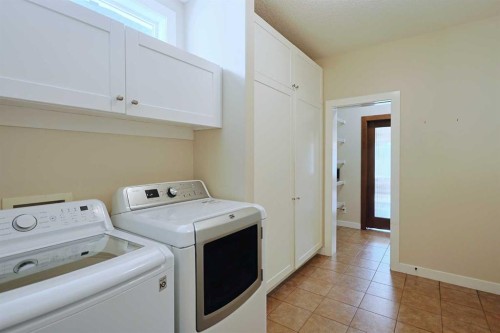 55 Tuscany Estates Drive Nw, Calgary, AB - Indoor Photo Showing Laundry Room