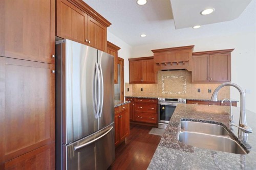 55 Tuscany Estates Drive Nw, Calgary, AB - Indoor Photo Showing Kitchen With Stainless Steel Kitchen With Double Sink With Upgraded Kitchen